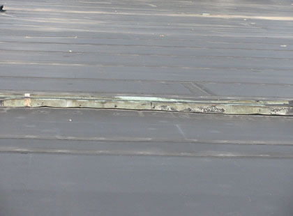 Pond Stains Indicate Too Low of a Slope for EPDM