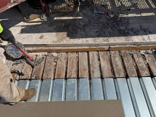 Rusted decking being replaced in the specific areas identified during our examinations. 