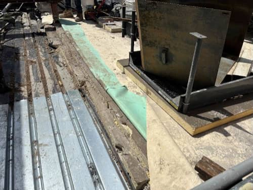 Overview of deck replacement as they overlay the new deck with the original intact deck. New insulation will be fastened and then membrane laid over top. 