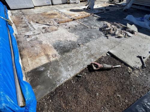 Sometimes there are many layers during a tear off.