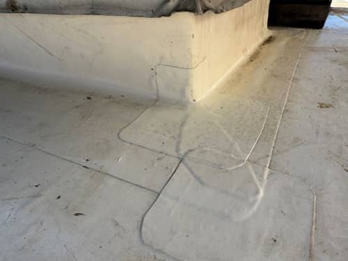 New field membrane and reinforced wall flashings.