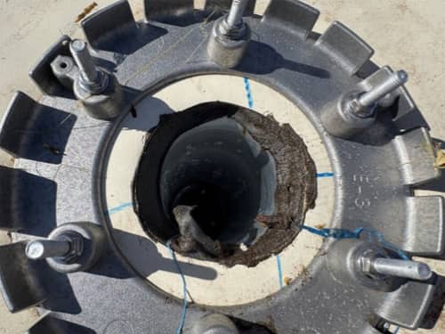 New drain in roof membrane.