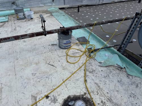 Overview of the new insulation and roof membrane during installation. 