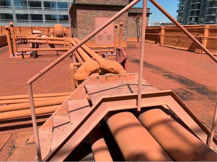 Pipes and conduits were also exposed in spots.