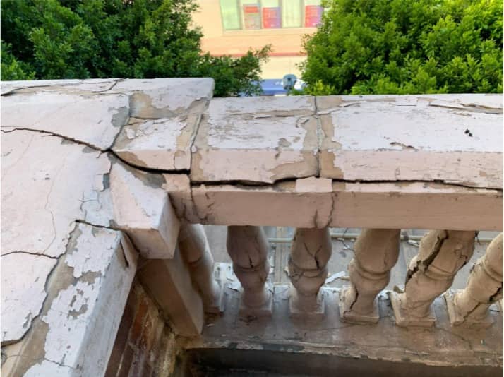 Crumbling cementitious/wood railing