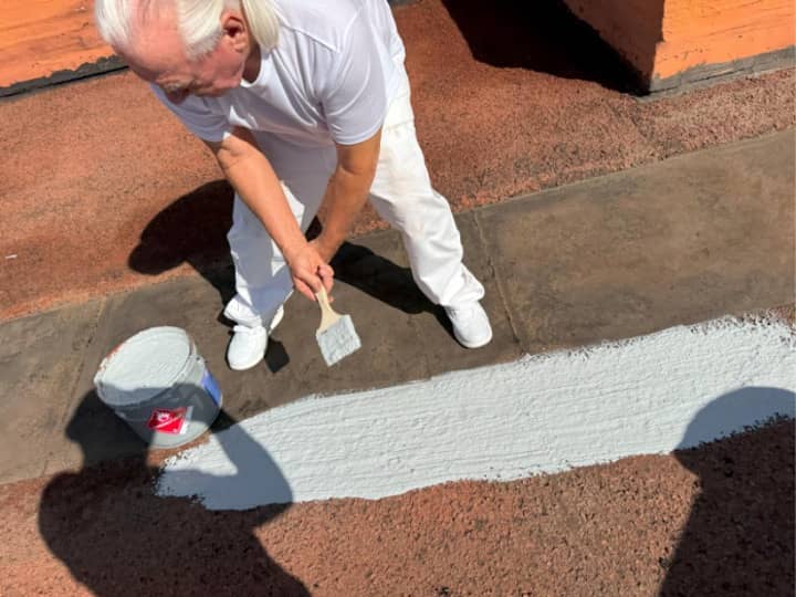 Demonstrating split repair in field of roof 