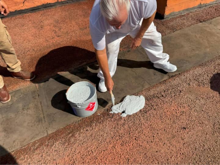 Demonstrating split repair in field of roof 
